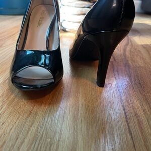 Black peep toe pumps